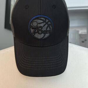 black on black adjustable Sixers cap